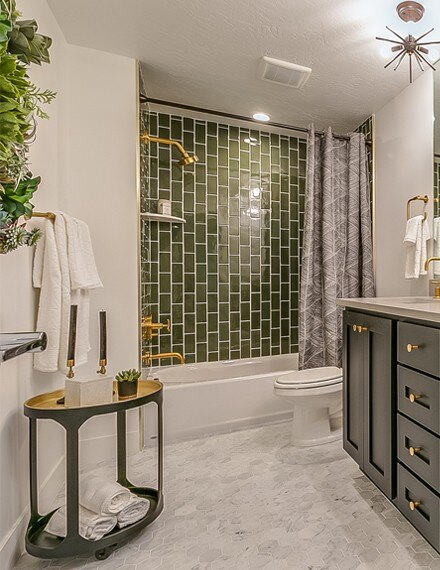 Bathroom with Green Subway Tile Wall in the Shower